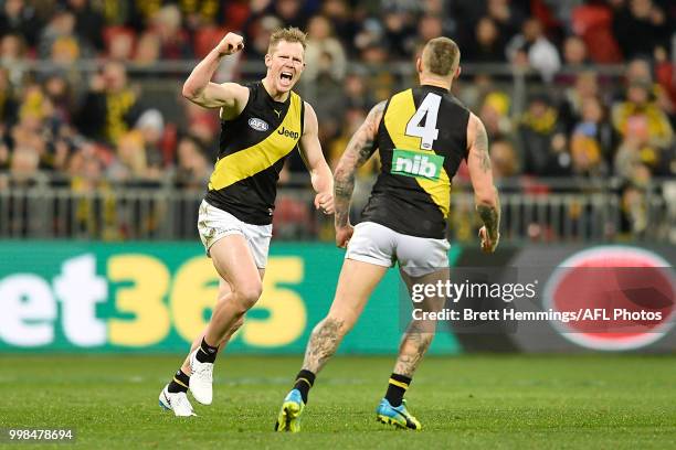 Jack Riewoldt of the Tigers celebrates kicking a goal during the round 17 AFL match between the Greater Western Sydney Giants and the Richmond Tigers...