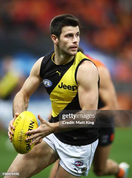 Trent Cotchin of the Tigers looks upfield during the round 17 AFL match between the Greater Western Sydney Giants and the Richmond Tigers at Spotless...