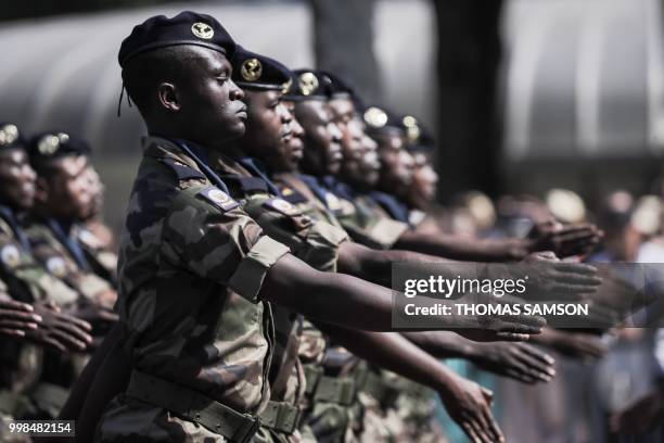 Soldiers of the Regiment du Service Militaire Adapte de Mayotte , take part in the annual Bastille Day military parade on the Champs-Elysees avenue...