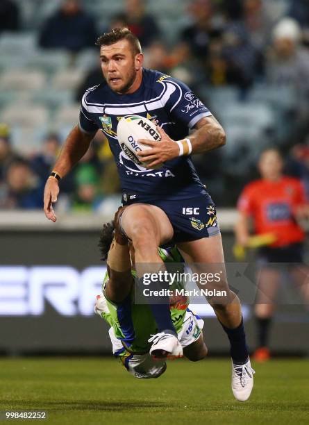 Kyle Feldt of the Cowboys runs the ball during the round 18 NRL match between the Canberra Raiders and the North Queensland Cowboys at GIO Stadium on...