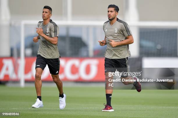 Joao Cancelo and Emre Can during a Juventus morning training session on July 14, 2018 in Turin, Italy.