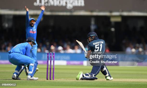 England batsman Jonathan Bairstow is bowled by India bowler Kuldeep Yadav as Virat Kohli celebrates during the 2nd ODI Royal London One Day...