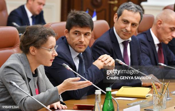 French Ambassador to Ukraine Isabelle Dumont speaks next to CEO of Airbus Helicopters Bruno Even before signing a contract in Kiev on July 14, 2018....