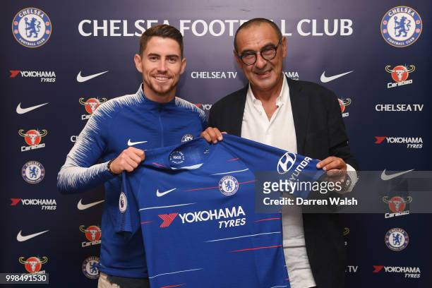 Chelsea Unveil New Signing Jorginho with Chelsea Head Coach Maurizio Sarri at Stamford Bridge on July 13, 2018 in London, England.