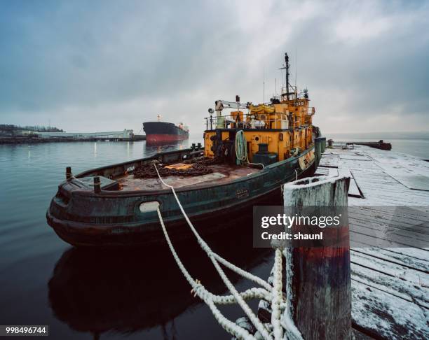 neglected tugboat - nautical structure stock pictures, royalty-free photos & images