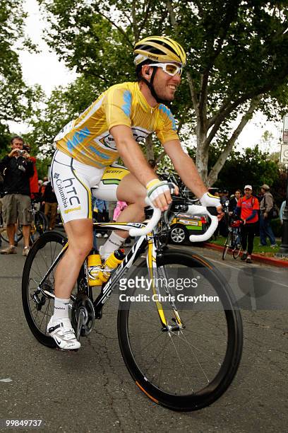 Mark Cavendish of Great Britian riding for team HTC-Columbia wearing the yellow leader's jersey rides to the start of stage two of the Tour of...