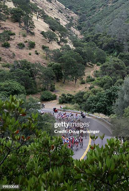 The peloton rolls along Pleasant Valley Road during Stage Two of the Tour of California from Davis to Santa Rosa on May 17, 2010 in Solano County,...