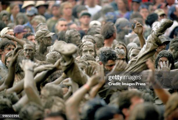 Crowds of muddy people during Woodstock circa 1994 in Saugerties.