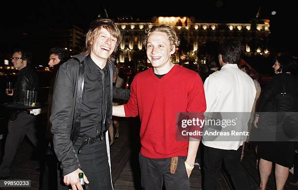 Alexander Scheer and Matthias Schweighoefer attends the German Films Reception at the Carlton Hotel during the 63rd Annual Cannes Film Festival on...