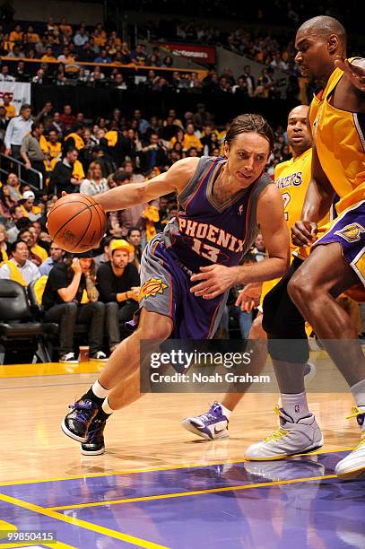 Steve Nash of the Phoenix Suns drives along the baseline against Andrew Bynum of the Los Angeles Lakers in Game One of the Western Conference Finals...