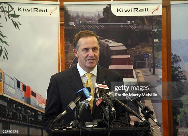 New Zealand Prime Minister John Key speaks to the media during a pre-Budget announcement regarding KiwiRail at Wellington Railway Station on May 18,...