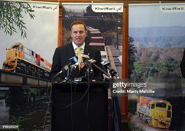 New Zealand Prime Minister John Key speaks to the media during a pre-Budget announcement regarding KiwiRail at Wellington Railway Station on May 18,...