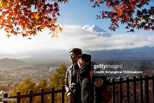 tourists habe a good time in japan. - climbs to all time high stock pictures, royalty-free photos & images