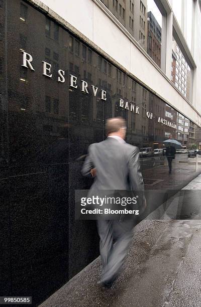 Pedestrian walks past the Reserve Bank of Australia headquarters in Sydney, Australia, on Tuesday, May 18, 2010. Australia's monetary policy is "well...