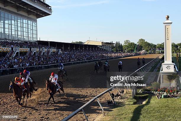 Lookin At Lucky, ridden by Martin Garcia, holds off First Dude, ridden by Ramon Dominguez, and Jackson Bend , ridden by Mike Smith, down the...