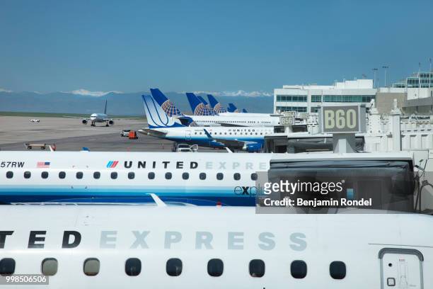 planes at airport - benjamin rondel stock pictures, royalty-free photos & images