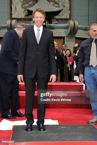 Producer Jerry Bruckheimer makes concrete impressions during his hand and footprint ceremony held at Grauman's Chinese Theatre on May 17, 2010 in...