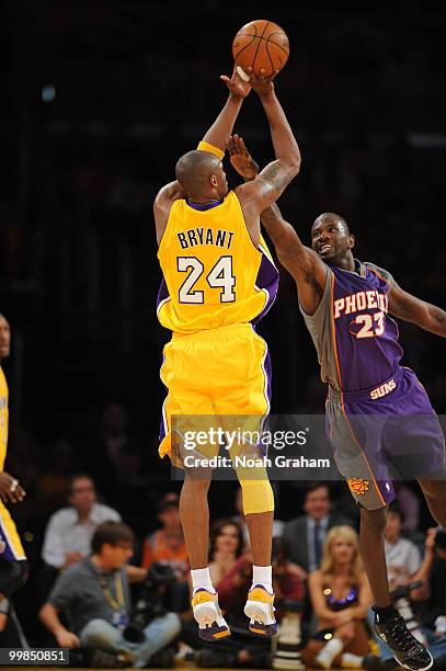 Kobe Bryant of the Los Angeles Lakers shoots against Jason Richardson of the Phoenix Suns in Game One of the Western Conference Finals during the...