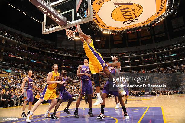 Andrew Bynum of the Los Angeles Lakers dunks against the Phoenix Suns in Game One of the Western Conference Finals during the 2010 NBA Playoffs at...