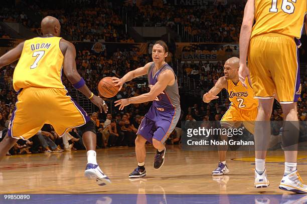 Steve Nash of the Phoenix Suns passes against Lamar Odom of the Los Angeles Lakers in Game One of the Western Conference Finals during the 2010 NBA...