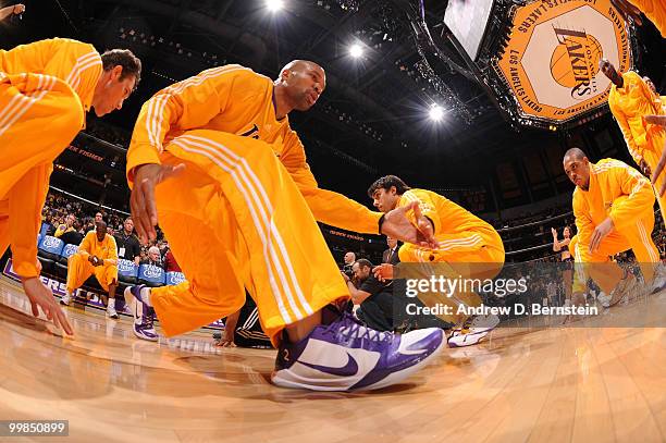 Derek Fisher of the Los Angeles Lakers is introduced in the starting lineups before taking on the Phoenix Suns in Game One of the Western Conference...