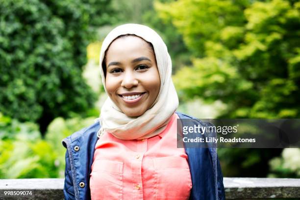 portrait of young muslim woman - lilly roadstones stock pictures, royalty-free photos & images