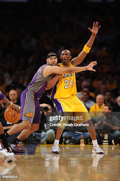 Kobe Bryant of the Los Angeles Lakers calls for the ball against Jared Dudley of the Phoenix Suns in Game One of the Western Conference Finals during...