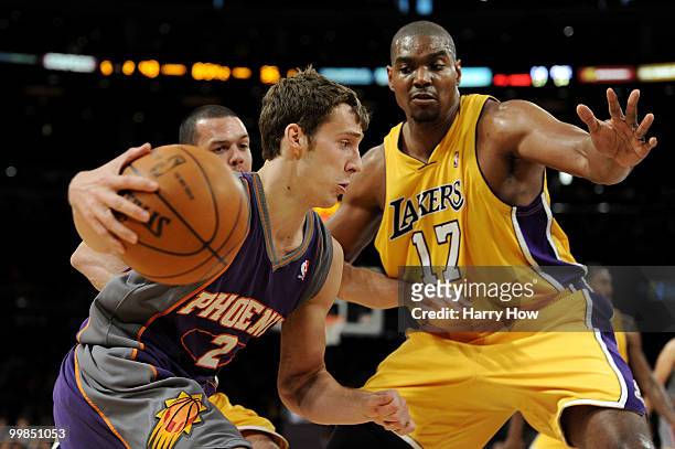 Guard Goran Dragic of the Phoenix Suns drives with the ball against Center Andrew Bynum of the Los Angeles Lakers in the Western Conference Finals...