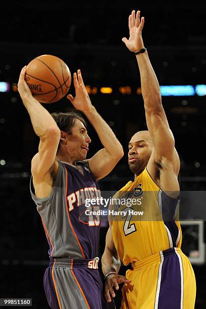 Guard Steve Nash of the Phoenix Suns looks to shoot the ball against guard Derek Fisher of the Los Angeles Lakers in Game One of the Western...