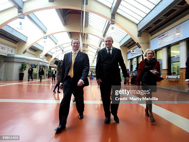 New Zealand Prime Minister John Key and Transport Minister Steven Joyce walk back to Parliament through the Wellington Railway Station after the...