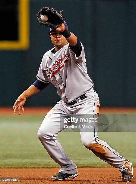 Infielder Jhonny Peralta of the Cleveland Indians catches a line drive at third against the Tampa Bay Rays during the game at Tropicana Field on May...