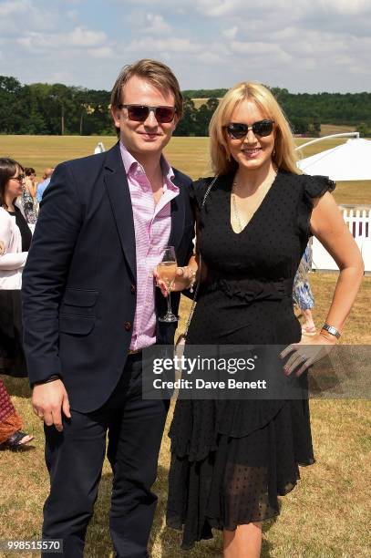 Conrad Baker and Emma Noble attend the Xerjoff Royal Charity Polo Cup 2018 on July 14, 2018 in Newbury, England.