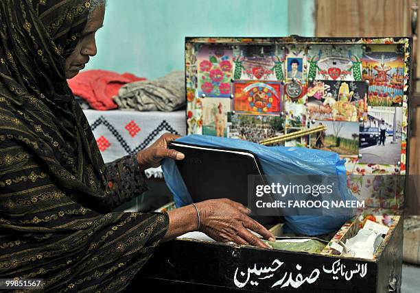 Pakistan-unrest-military,FEATURE by Khurram Shahzad In this picture taken on February 21 Munawar Noor, mother of a martyred Pakistani soldier looks...