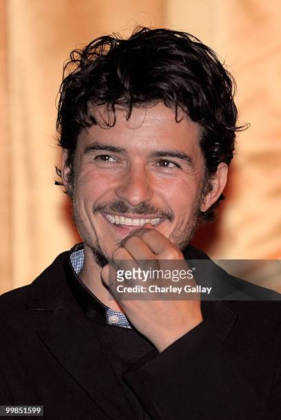Actor Orlando Bloom speaks onstage before the screening of "Pirates of the Caribbean: The Curse of the Black Pearl" during AFI & Walt Disney...