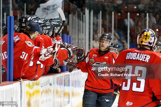 Taylor Hall of the Windsor Spitfires celebrates this third-period goal against the Calgary Hitmen with teammates during the 2010 Mastercard Memorial...