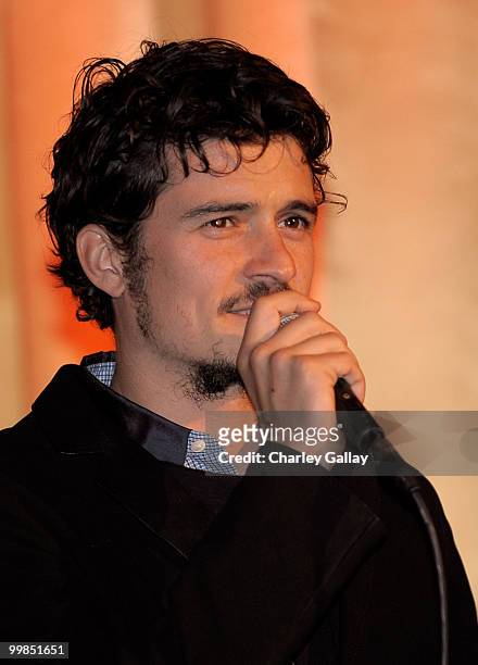 Actor Orlando Bloom speaks onstage before the screening of "Pirates of the Caribbean: The Curse of the Black Pearl" during AFI & Walt Disney...