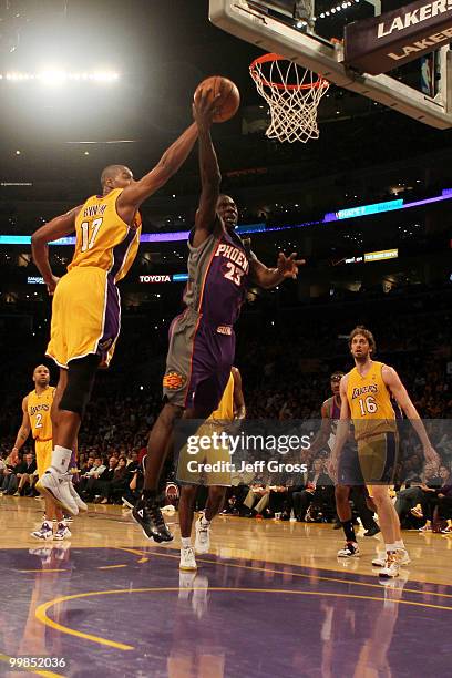 Guard Jason Richardson of the Phoenix Suns goes up for a shot as center Andrew Bynum of the Los Angeles Lakers defends in Game One of the Western...