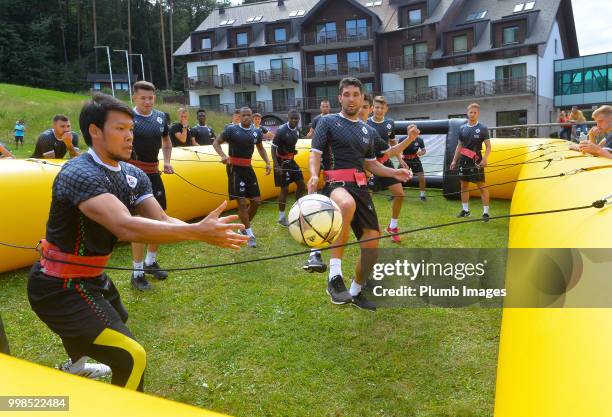 Kawin Thamsatchanan with Clément Fabre during team bonding activities during the OHL Leuven training session on July 09, 2018 in Maribor, Slovenia