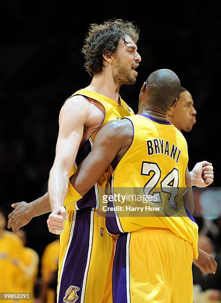 Guard Kobe Bryant of the Los Angeles Lakers and Pau Gasol celebrate a play against the Phoenix Suns in Game One of the Western Conference Finals...