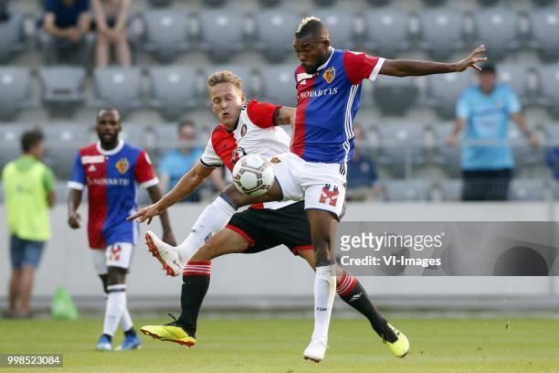 , Jens Toornstra of Feyenoord, Geoffroy Serey Die of FC Basel during the Uhrencup match between FC Basel 1893 and Feyenoord at the Tissot Arena on...