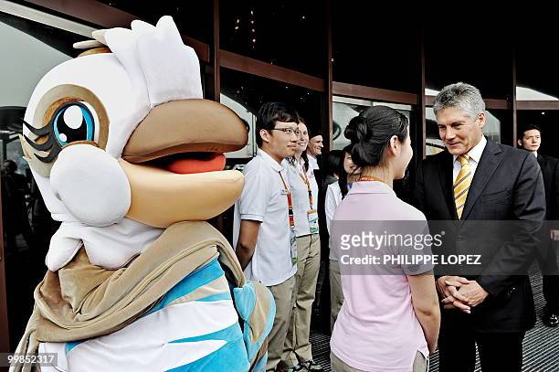 Australian Foreign Minister Stephen Smith meets staff members during the official inauguration of the Australian pavilion at the site of the World...
