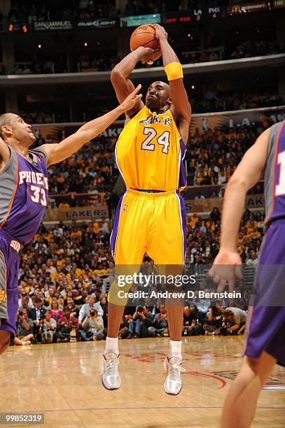 Kobe Bryant of the Los Angeles Lakers shoots against Grant Hill of the Phoenix Suns in Game One of the Western Conference Finals during the 2010 NBA...