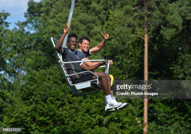 Kamal Sowah with Kawin Thamsatchanan during team bonding activities during the OHL Leuven training session on July 09, 2018 in Maribor, Slovenia