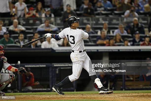 Alex Rodriguez of the New York Yankees hits a two-run home run in the ninth inning against the Boston Red Sox on May 17, 2010 at Yankee Stadium in...