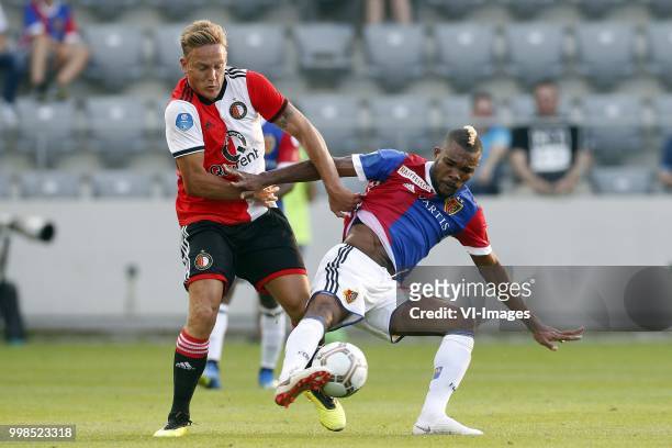 , Jens Toornstra of Feyenoord, Geoffroy Serey Die of FC Basel during the Uhrencup match between FC Basel 1893 and Feyenoord at the Tissot Arena on...