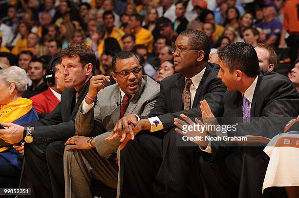 Head coach Alvin Gentry of the Phoenix Suns sits between assistant coaches Dan Majerle and Bill Cartwright during Game One of the Western Conference...