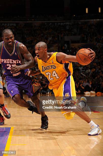Kobe Bryant of the Los Angeles Lakers drives past Jason Richardson of the Phoenix Suns in Game One of the Western Conference Finals during the 2010...