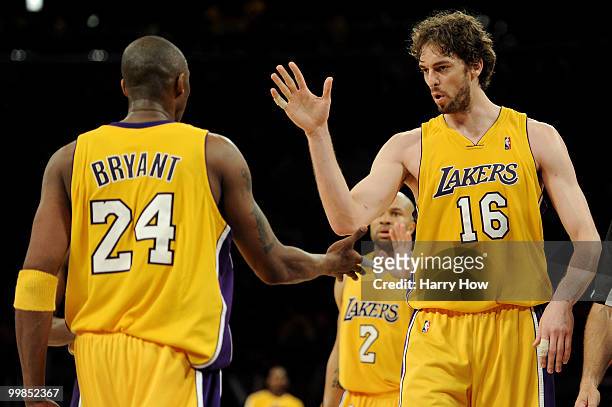 Guard Kobe Bryant of the Los Angeles Lakers and Pau Gasol celebrate a play against the Phoenix Suns in Game One of the Western Conference Finals...