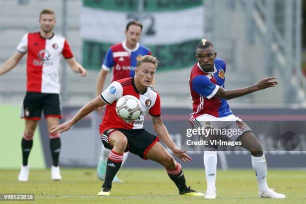 , Jens Toornstra of Feyenoord, Geoffroy Serey Die of FC Basel during the Uhrencup match between FC Basel 1893 and Feyenoord at the Tissot Arena on...