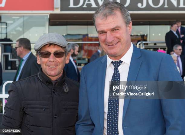 Brad Trainer Darren Weir poses with stable track walker Darryn Murphy after the win of Voodoo Lad in Race 7, Sir John Monash Stakes during Melbourne...